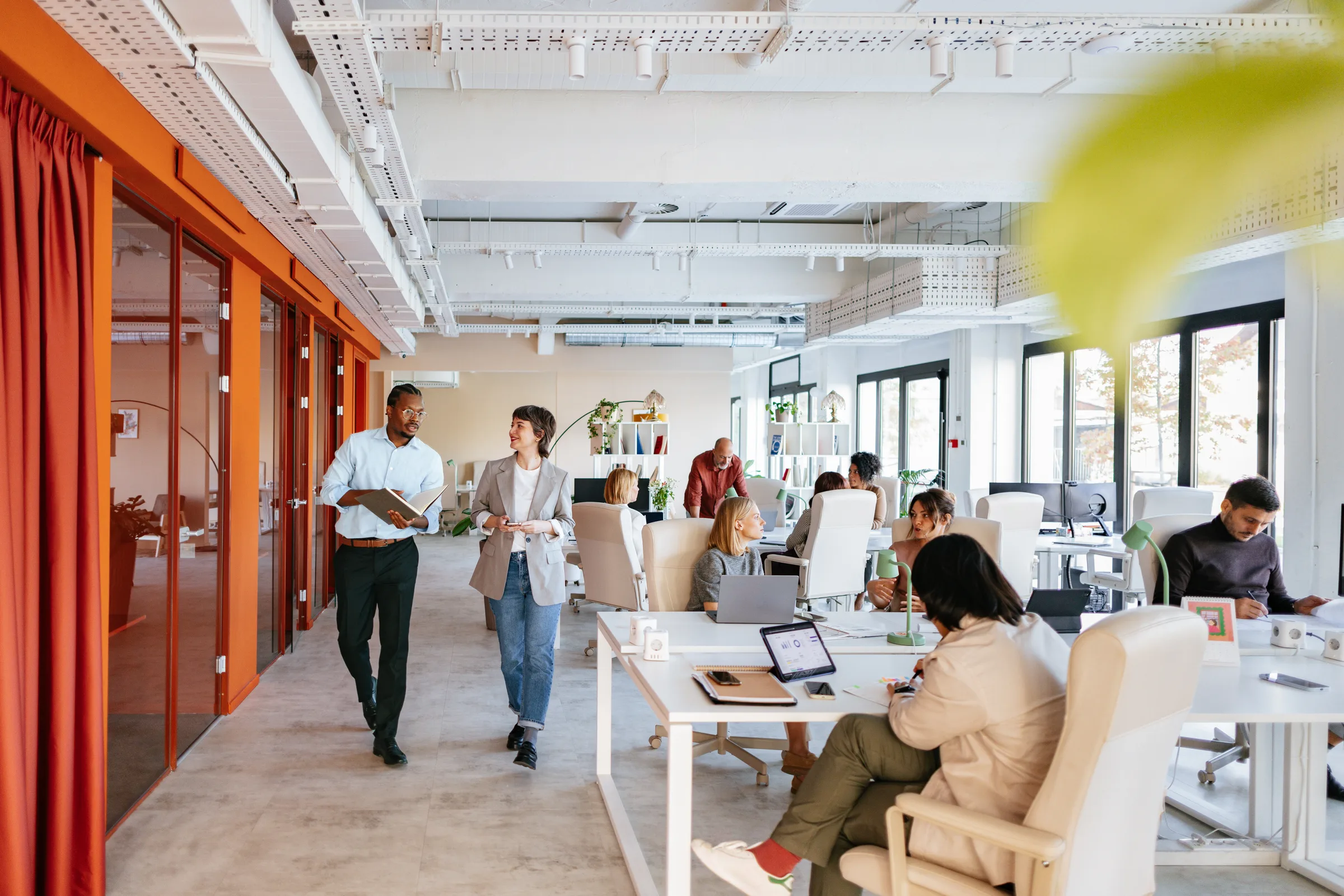 Team working in a bright office that remains open during renovation