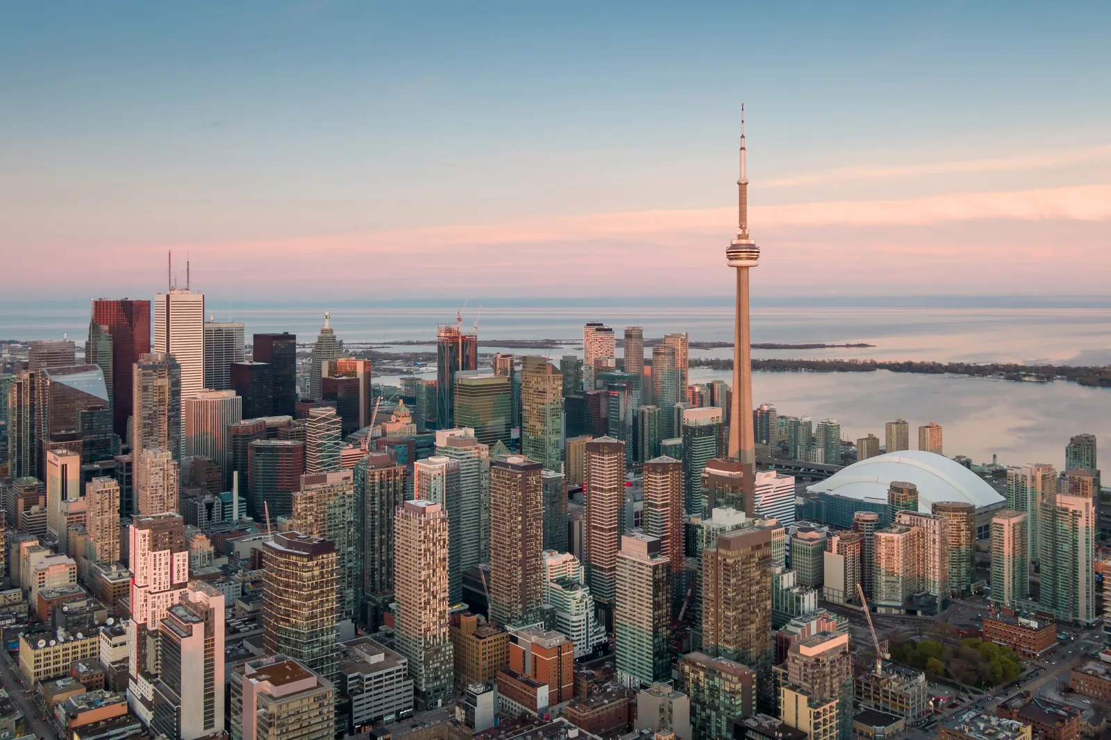 Aerial view of the Toronto skyline and financial district at sunset
